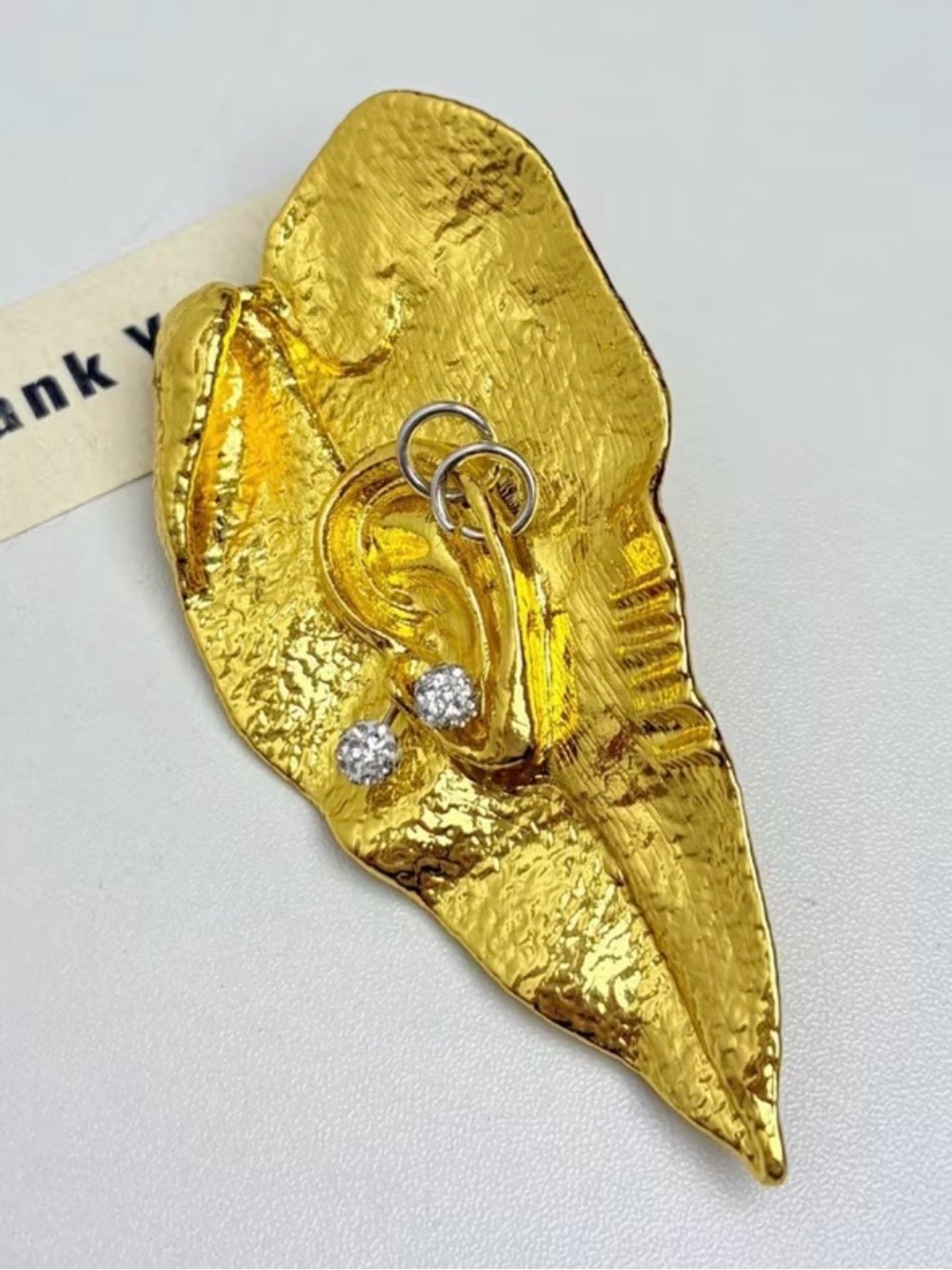 Schiaparelli Inspired Gold Leaf-Shaped Statement Brooch with Ear Motif